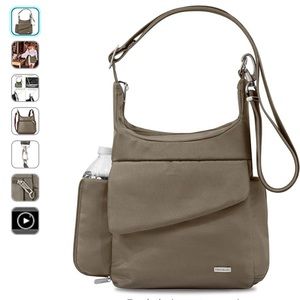 Travelon Anti theft Messenger Bag with Water Bottle Compartment.  New and Unused